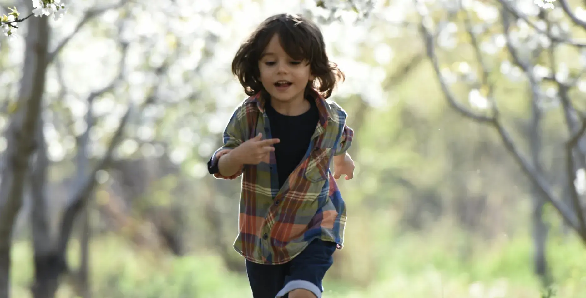 Child running in a park
